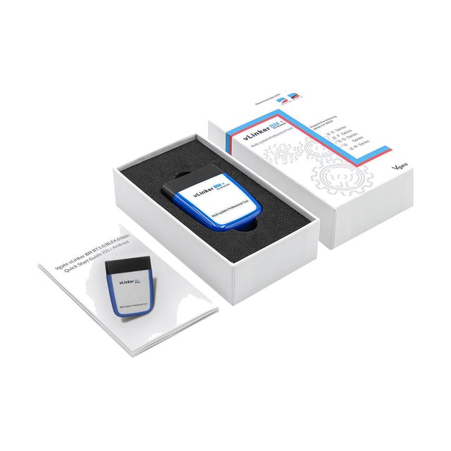 Blau-weißer Vgate vLinker BM+ in der geöffneten Verpackung, neben der Anleitung